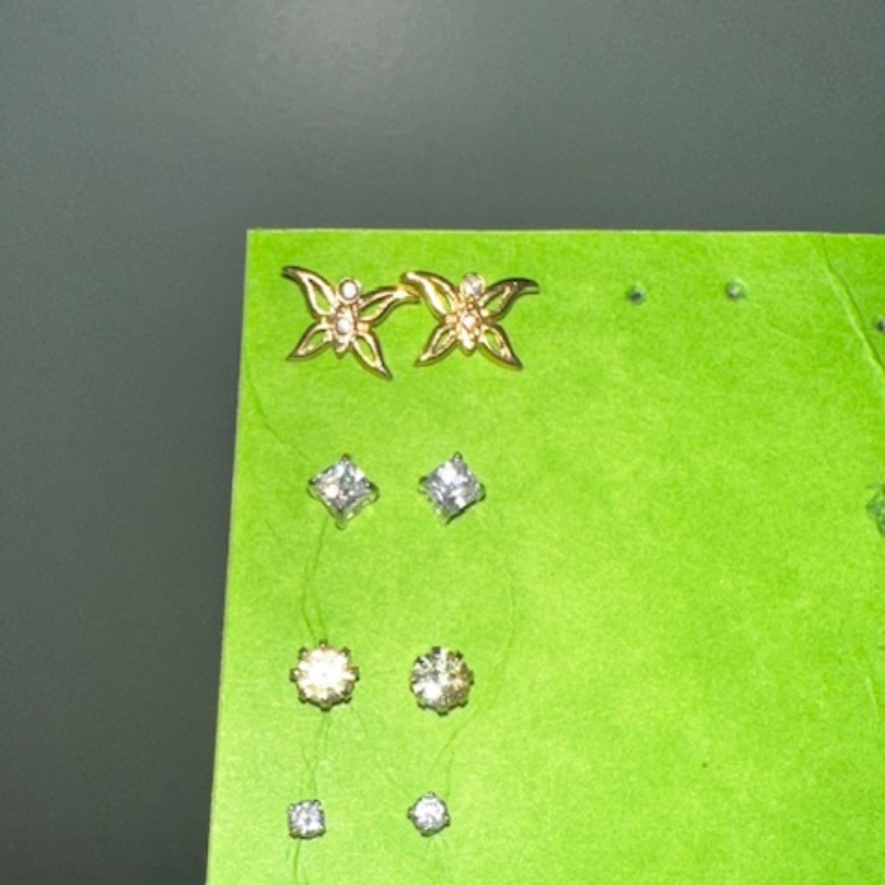 Brand new fashion earrings. Studs. Avon. Gold butterfly, white CZ, light green